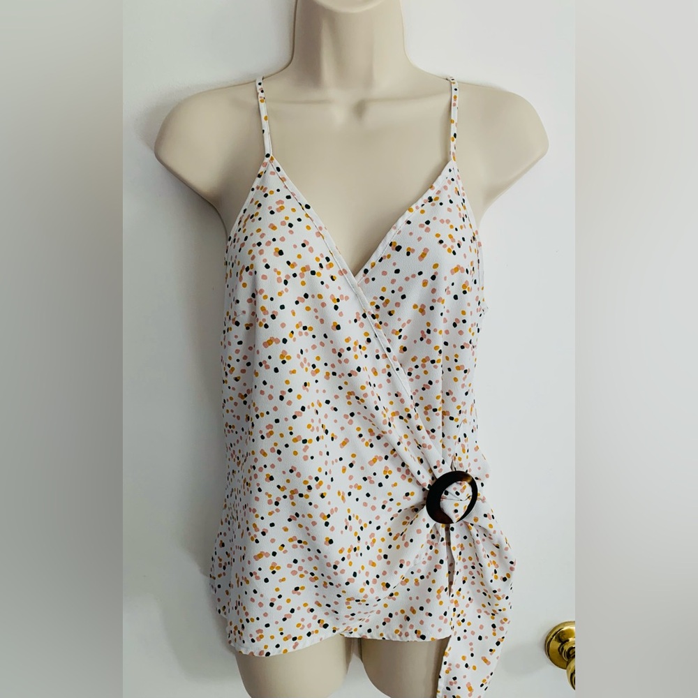E&M sleeveless blouse, with adjustable sashed buckle on side. Size S, like new.